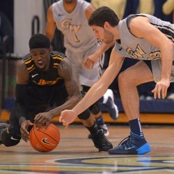 Basketball player grabbing ball another stealing related articles