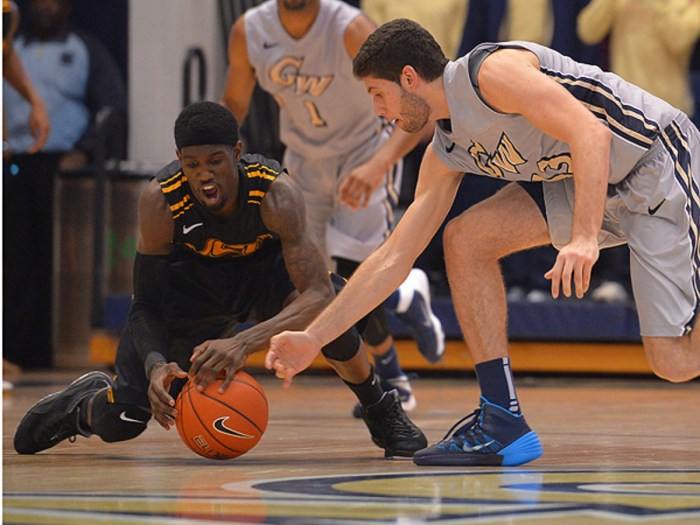 Basketball player grabbing ball another stealing related articles